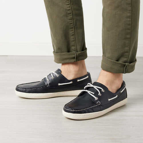 Men’s Runabout Shoes in Navy, on man, moccasin construction, handsewn leather, cushioned insoles, Vibram Cup sole, Quoddy
